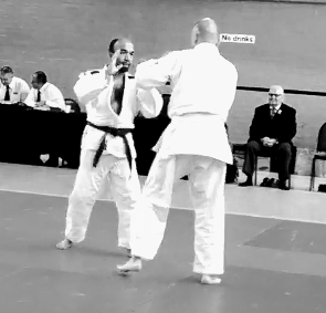Black and white image of Sensei Anthony against an opponent during competitive judo